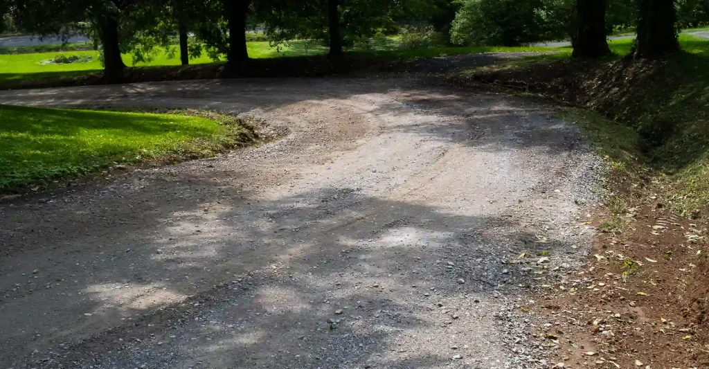 eroded gravel driveway